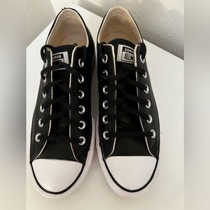 Black leather platform sneakers